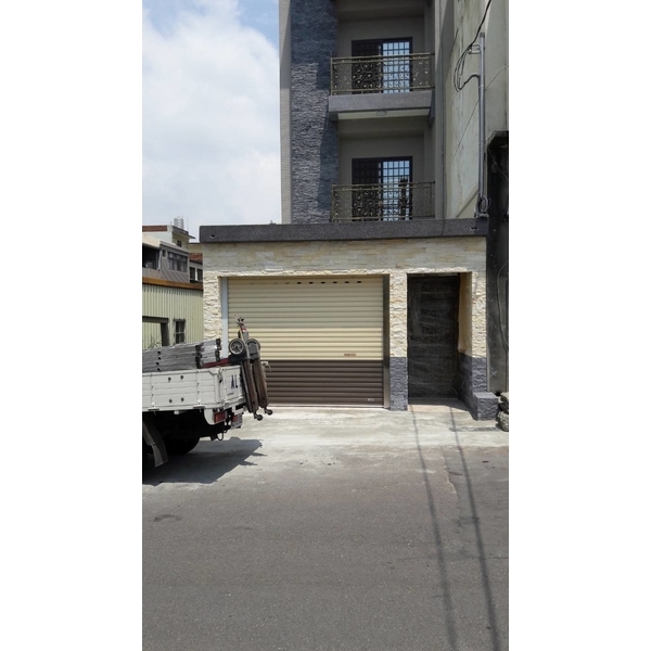 格來得捲門,旭棚企業有限公司