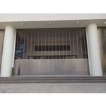 平鎮湧光禪寺-不銹鋼捲門(箱體及軌道均以牆壁同色系烤漆封板包覆以達美觀) - 岳進興金屬門窗有限公司