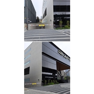 新北市林口區-商辦大樓  訂製款電動柵欄機 - 碩譽電機股份有限公司